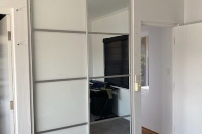 Sliding Supa White Glass & Mirror Doors with Matt Silver Glazing Bars