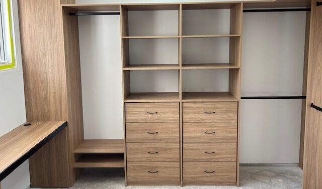 Coloured laminate walk in wardrobe (with black handles & shelf stiffeners)