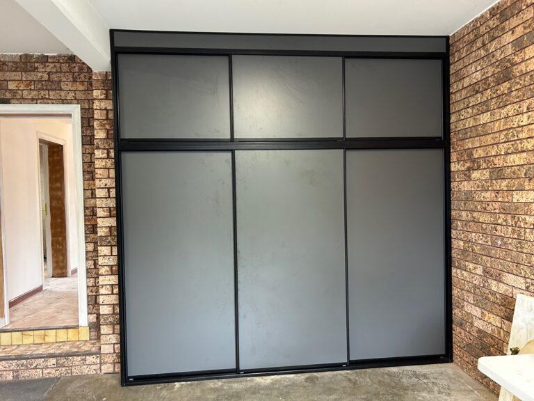 Coloured laminate (9mm) sliding doors with Black aluminium