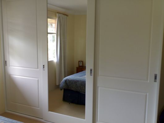 Routed (2 Panel) with Decor Mirror Poly Doors